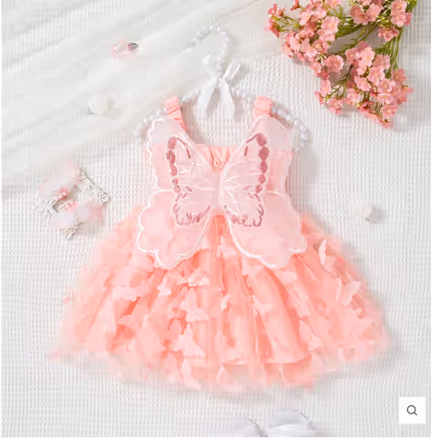 Vestido rosa mariposa con alas